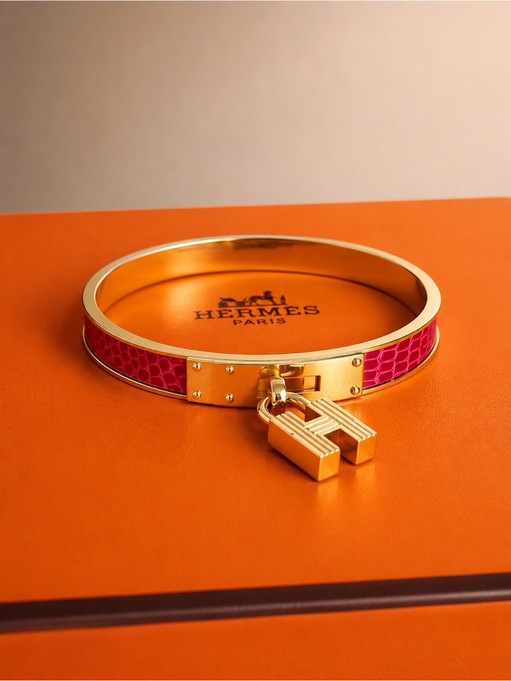 Hermes Gold-Plated Bangle with Fuchsia Croc-Embossed Inlay